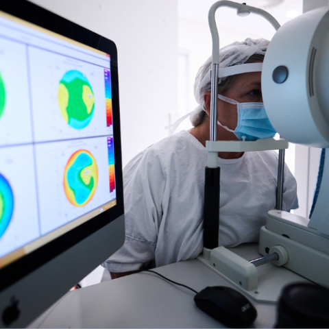A lady having her eyes tested for laser eye surgery